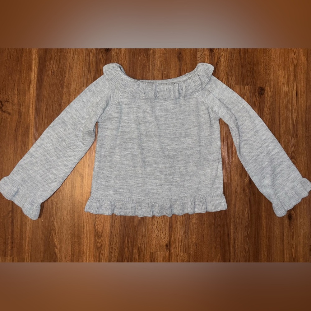 Great off the shoulder sweater with ruffle detail